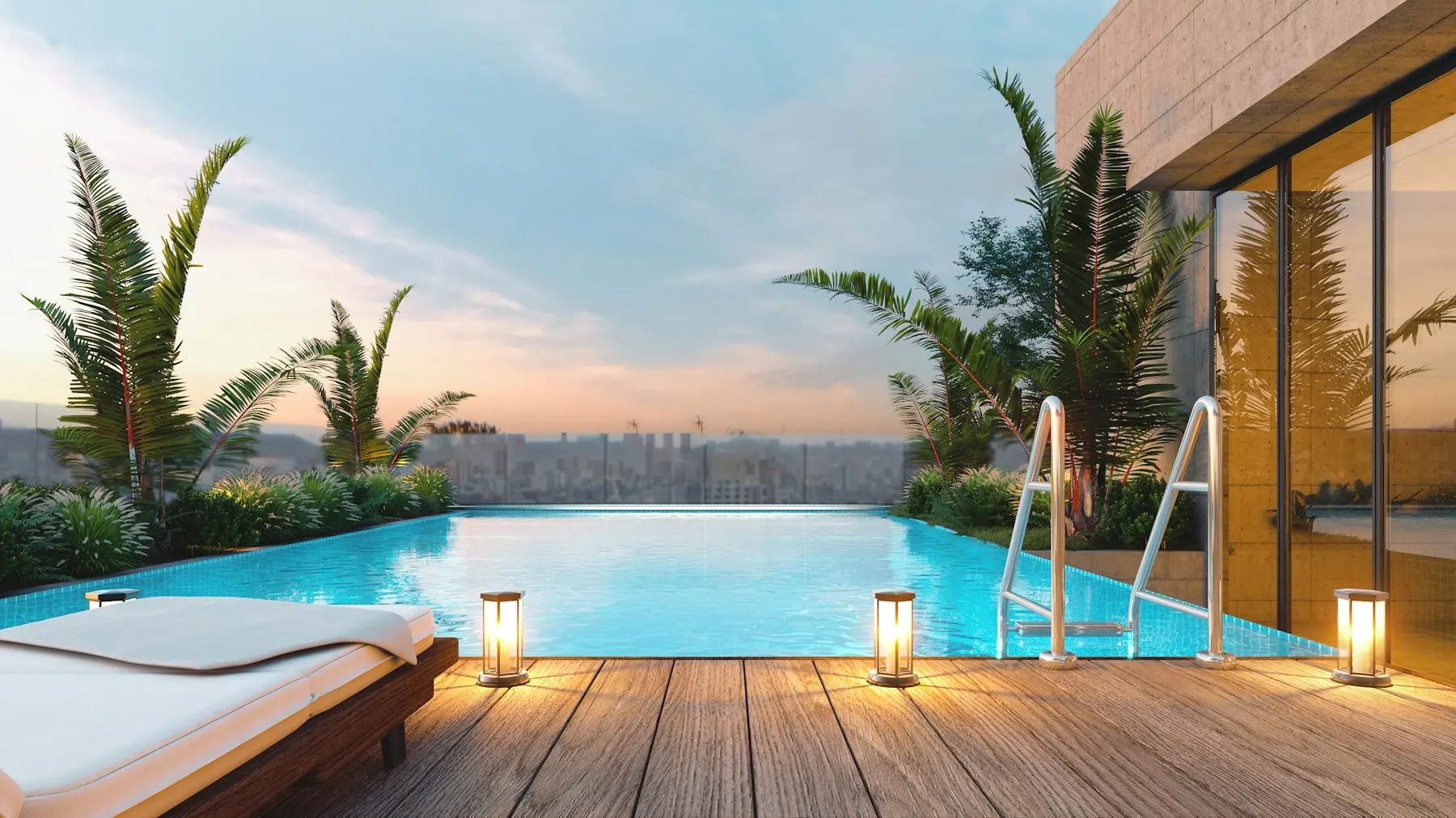 Piscina de borda infinita em terraço ao pôr do sol